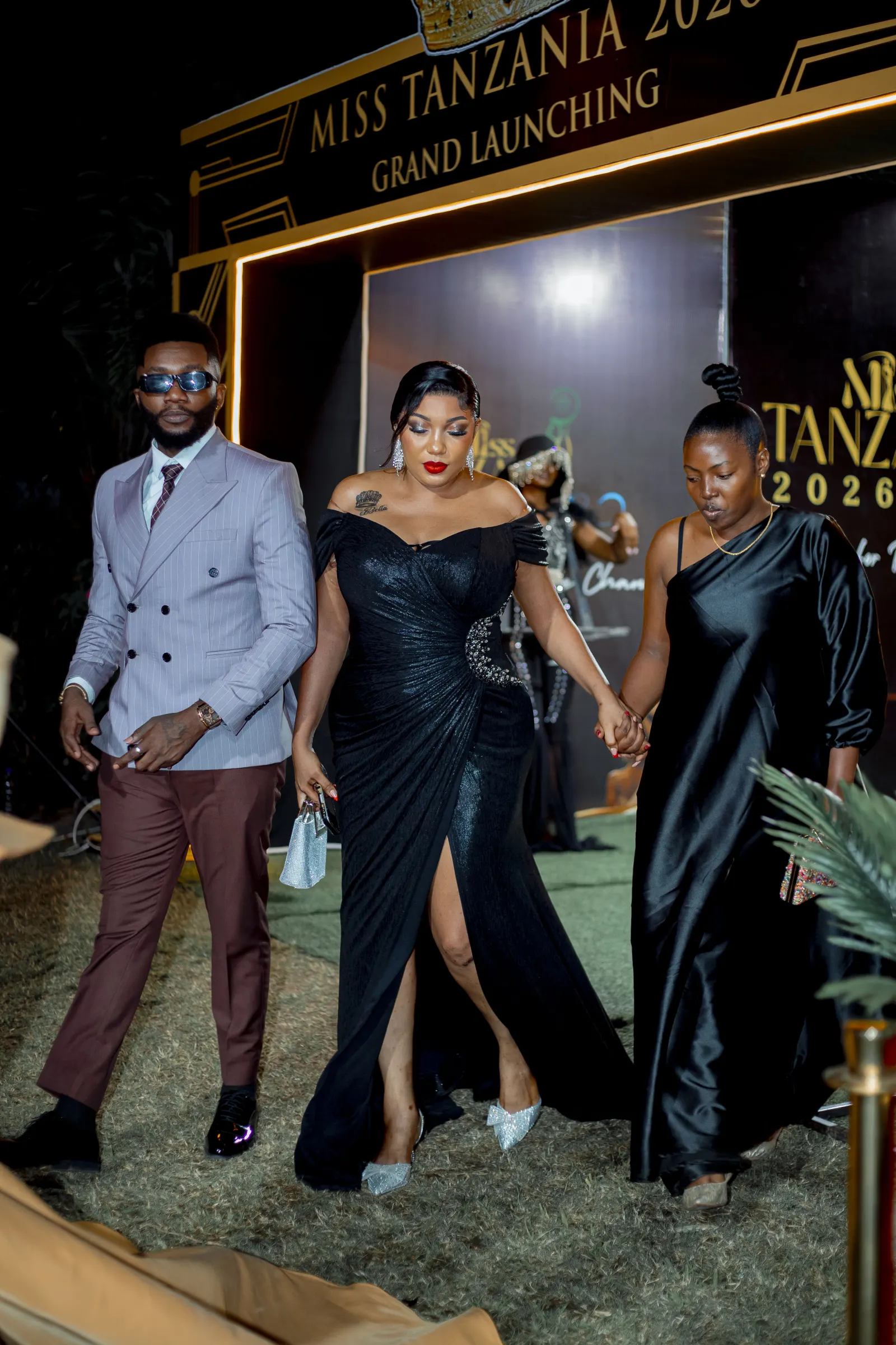 Guests walking past the Miss Tanzania 2026 Grand Launching arch
