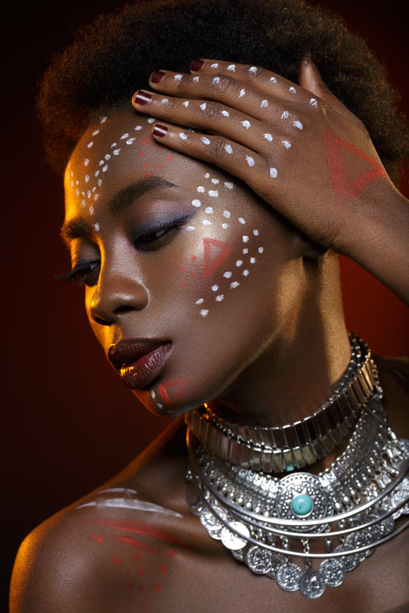 Artistic makeup with a silver coin necklace